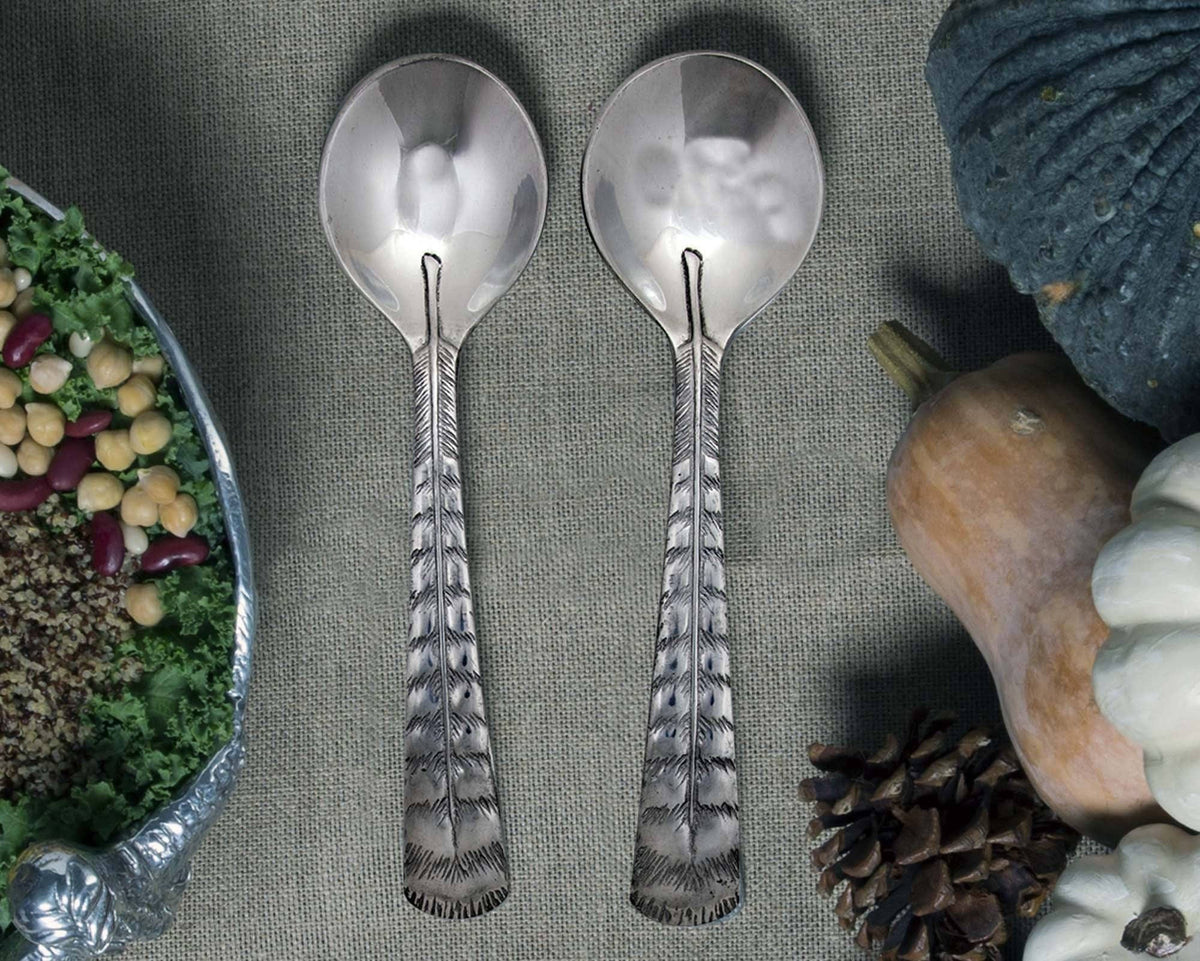 https://www.arthurcourt.com/cdn/shop/products/arthur-court-game-birds-feather-salad-servers-219h11-31867491287155_1200x.jpg?v=1678074937